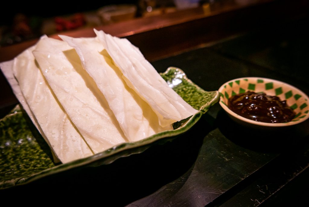 Izakaya appetizers at Nakama, a Japanese restaurant in Shanghai specializing in high-grade beef yakiniku. Photo by Rachel Gouk. 