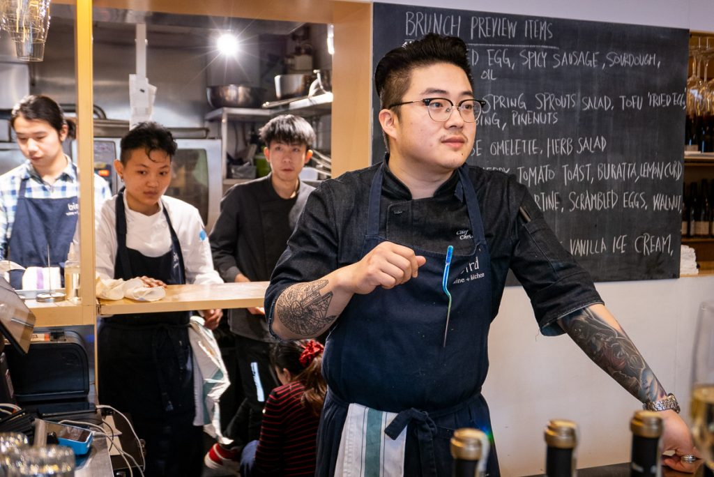 Chef Chris Zhu at Bird, a casual restaurant and bar in Shanghai serving small, sharing plates with a hint of Chinese ingredients. Photo by Rachel Gouk. 