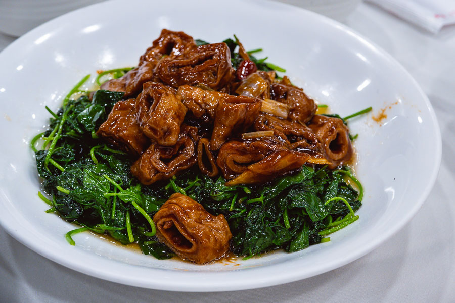 Braised intestines with caotou (clover), a hyper-Shanghainese dish. Where to eat Shanghainese food in Shanghai: Rui Fu Yuan, a restaurant in Xuhui district, Shanghai. Photo by Rachel Gouk @ Nomfluence.