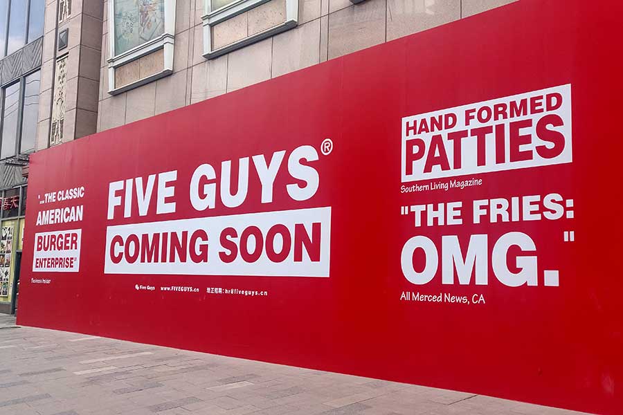 Famed US burger chain Five Guys opens in Shanghai on Shaanxi Lu and Huaihai Zhong Lu. April 2021. Photo by Rachel Gouk @ Nomfluence.