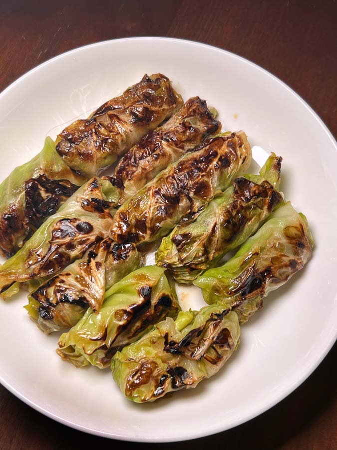 Recipe for stuffed cabbage rolls. A simple, satisfying meal at home. Photos & Recipe by Rachel Gouk @ Nomfluence.