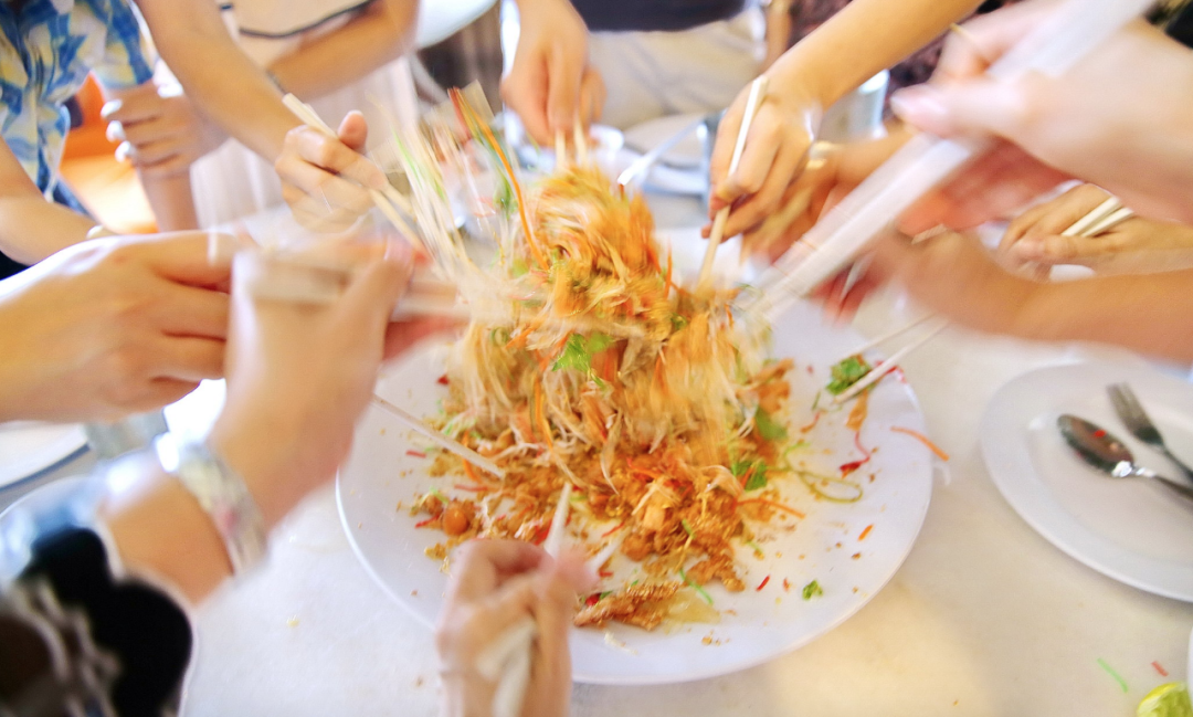 Yee Sang or Lou Hei or Yu Sheng is a popular festive dish in Malaysia and Singapore, eaten during Chinese New Year for prosperity and luck.