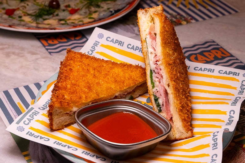 Capri by Bottega is an Italian restaurant and pizzeria specializing in cuisine from Naples like cartwheel pizza