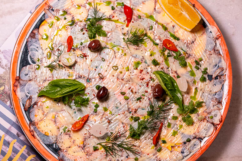 Capri by Bottega is an Italian restaurant and pizzeria specializing in cuisine from Naples like cartwheel pizza