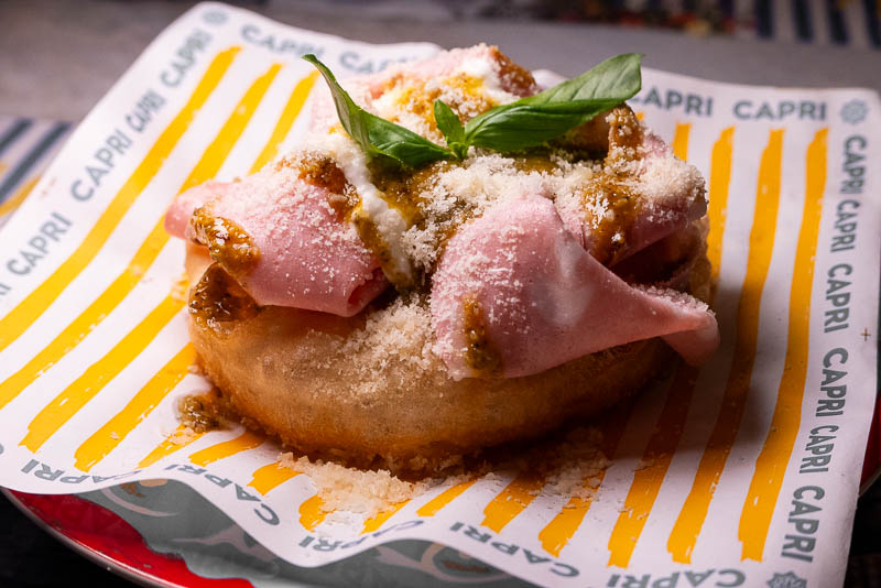 Capri by Bottega is an Italian restaurant and pizzeria specializing in cuisine from Naples like cartwheel pizza