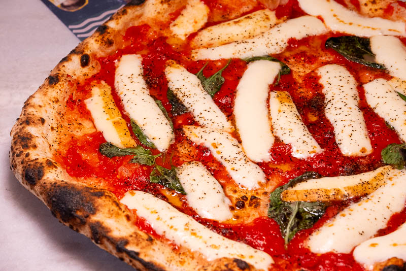 Capri by Bottega is an Italian restaurant and pizzeria specializing in cuisine from Naples like cartwheel pizza