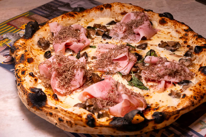 Capri by Bottega is an Italian restaurant and pizzeria specializing in cuisine from Naples like cartwheel pizza