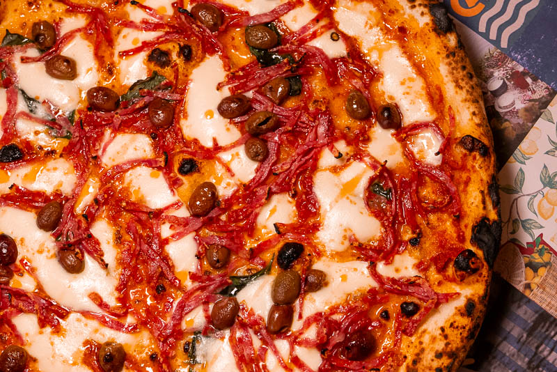 Capri by Bottega is an Italian restaurant and pizzeria specializing in cuisine from Naples like cartwheel pizza