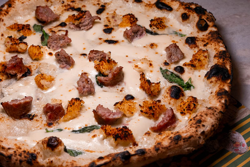 Capri by Bottega is an Italian restaurant and pizzeria specializing in cuisine from Naples like cartwheel pizza