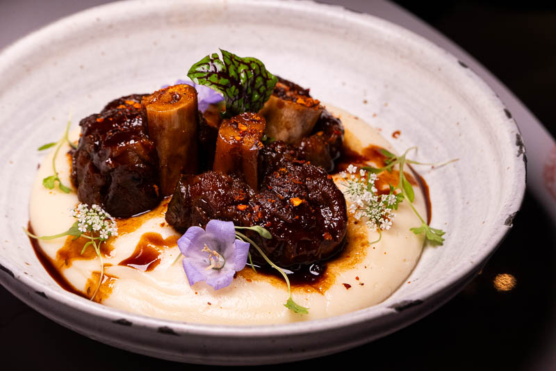 Laizhou Bar is a contemporary Chinese restaurant serving modern Sichuan, Guizhou, and Yunnan food in Shanghai