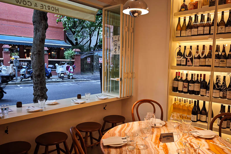 Street-facing seats at Horse & Cow French-Chinese bistro in Shanghai