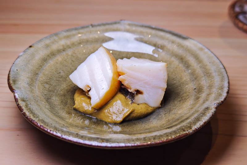 Abalone pieces with a sauce made from abalone liver.
